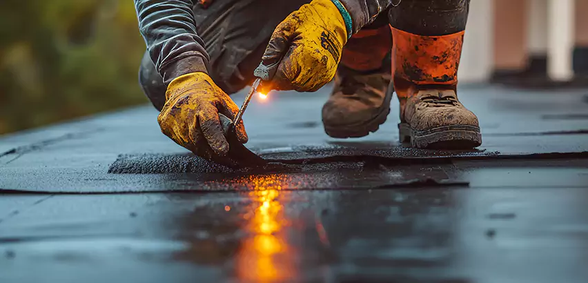 EPDM Roof Repair Tape Application in Belleville