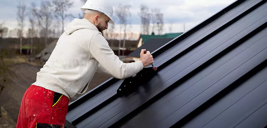 Tin Roof Ridge Cap Installation in Belleville
